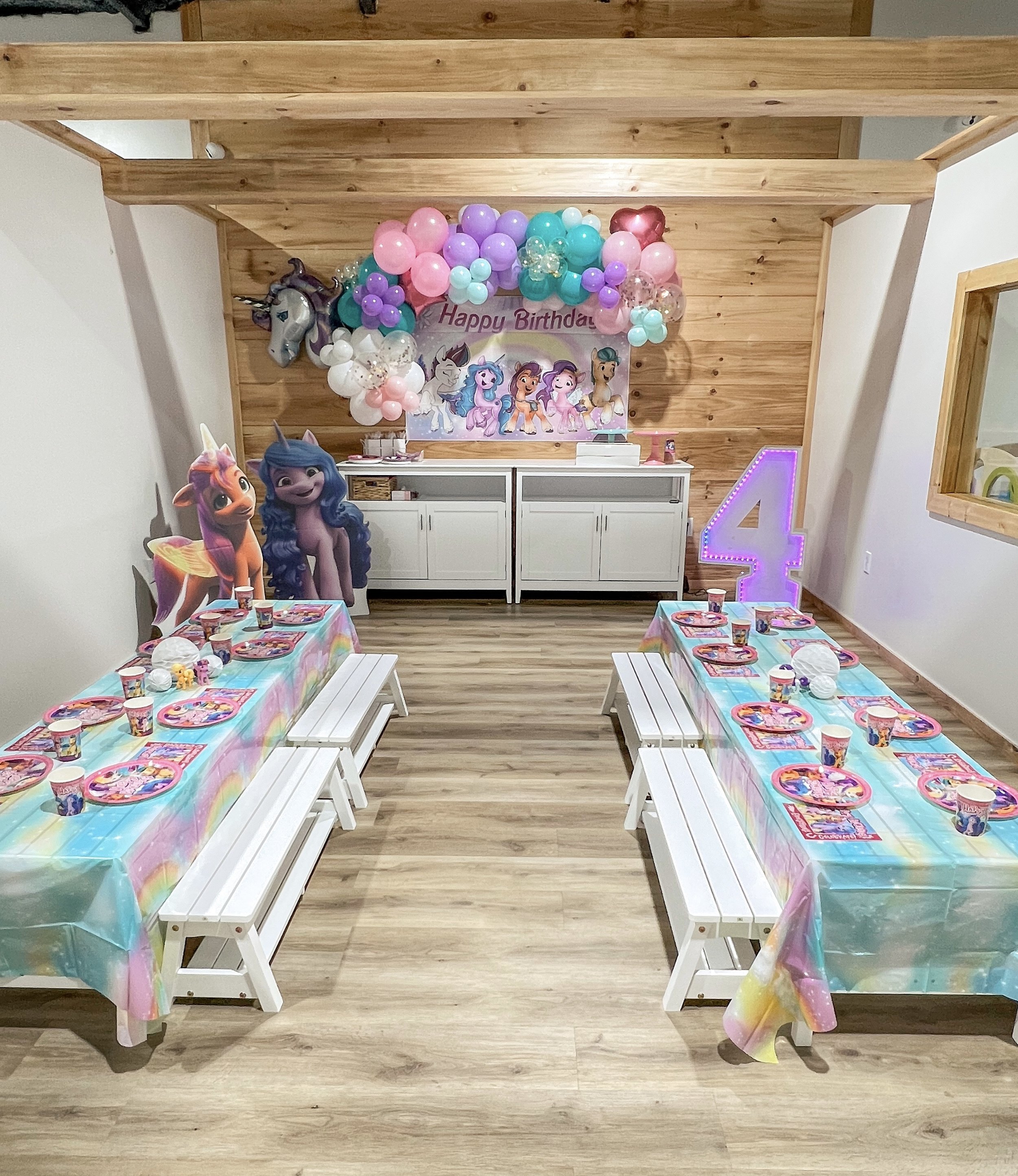 Colorful themed birthday party setup at Little Peaches.