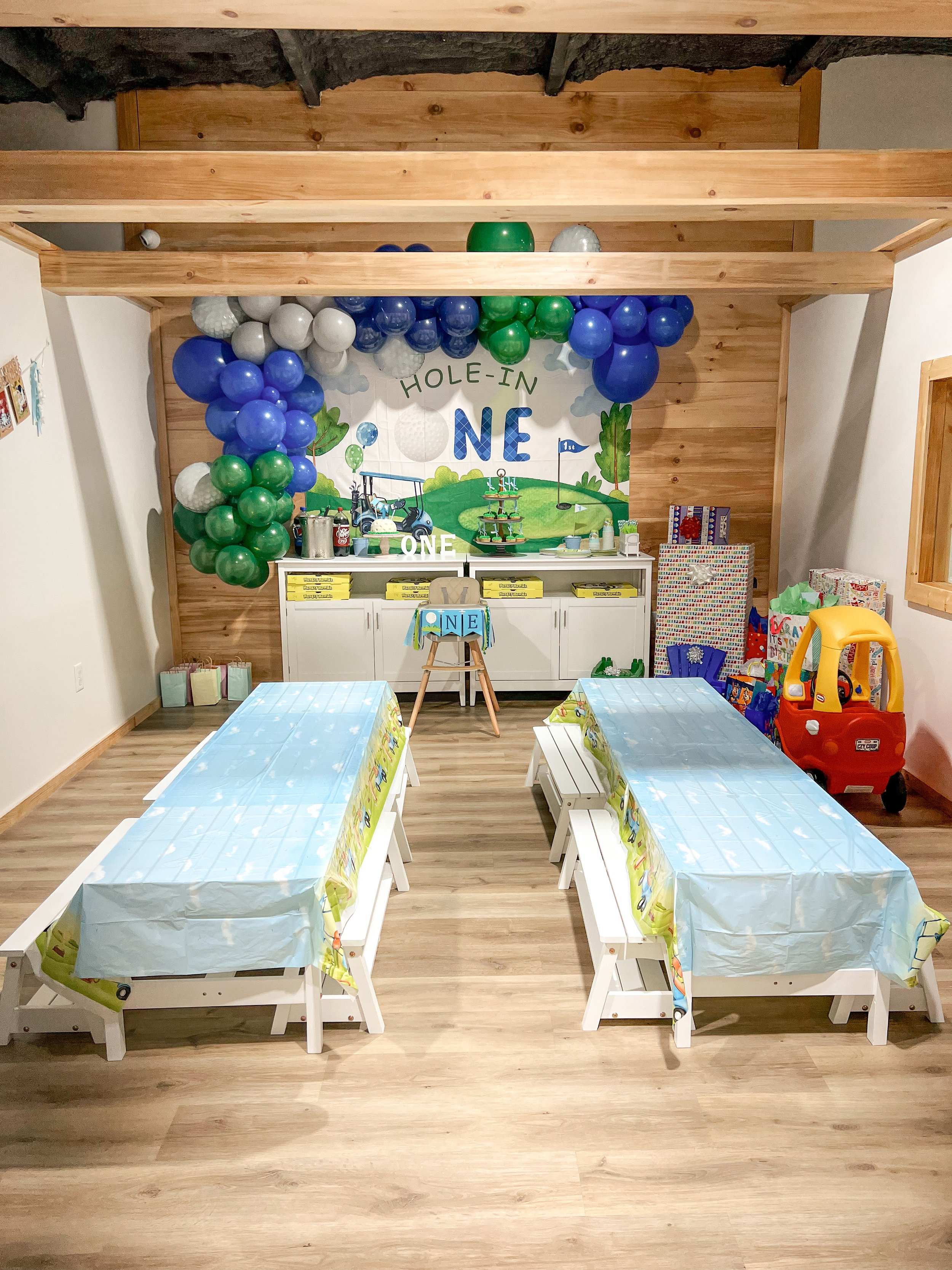Decorated party room with balloons.